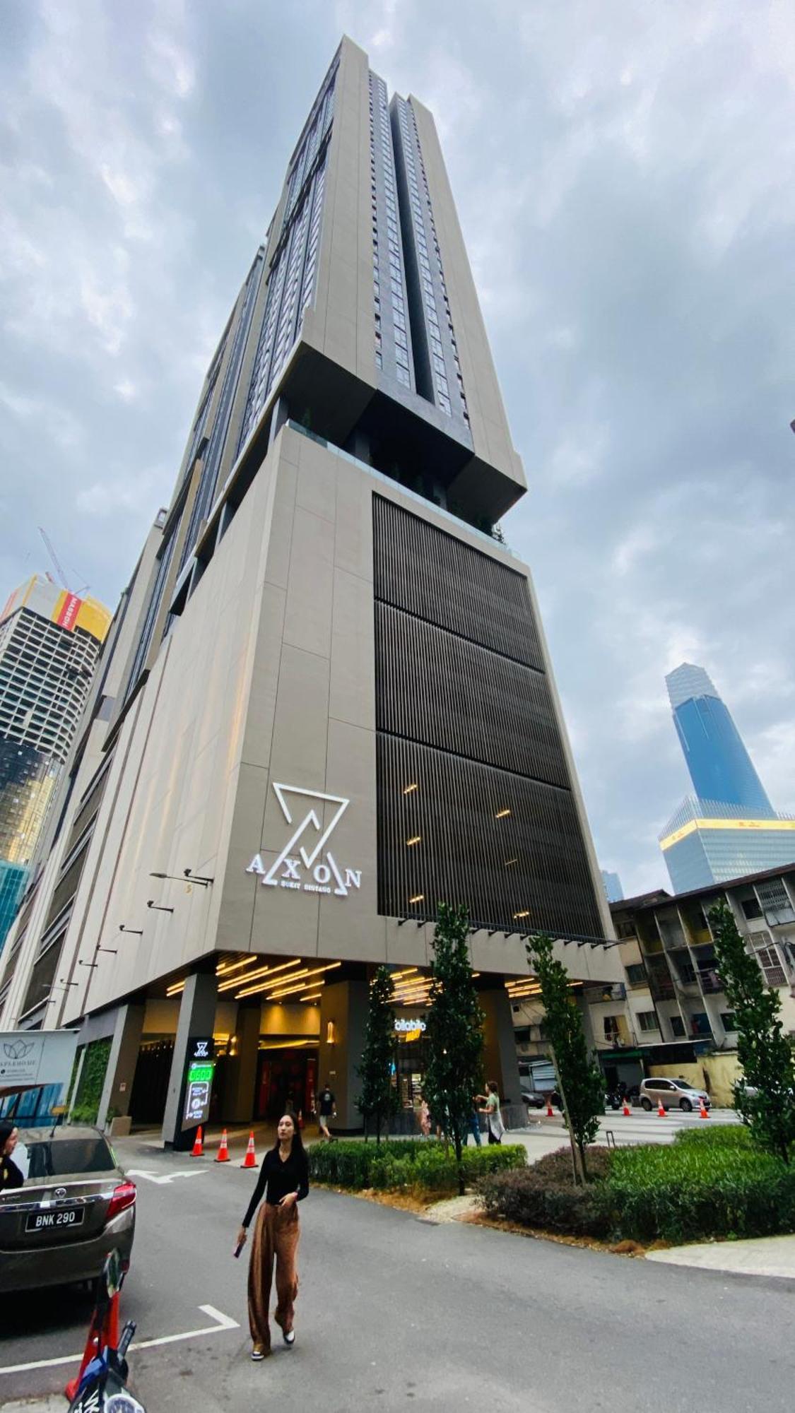 Axon Suites By Galaxy House Apartemen
