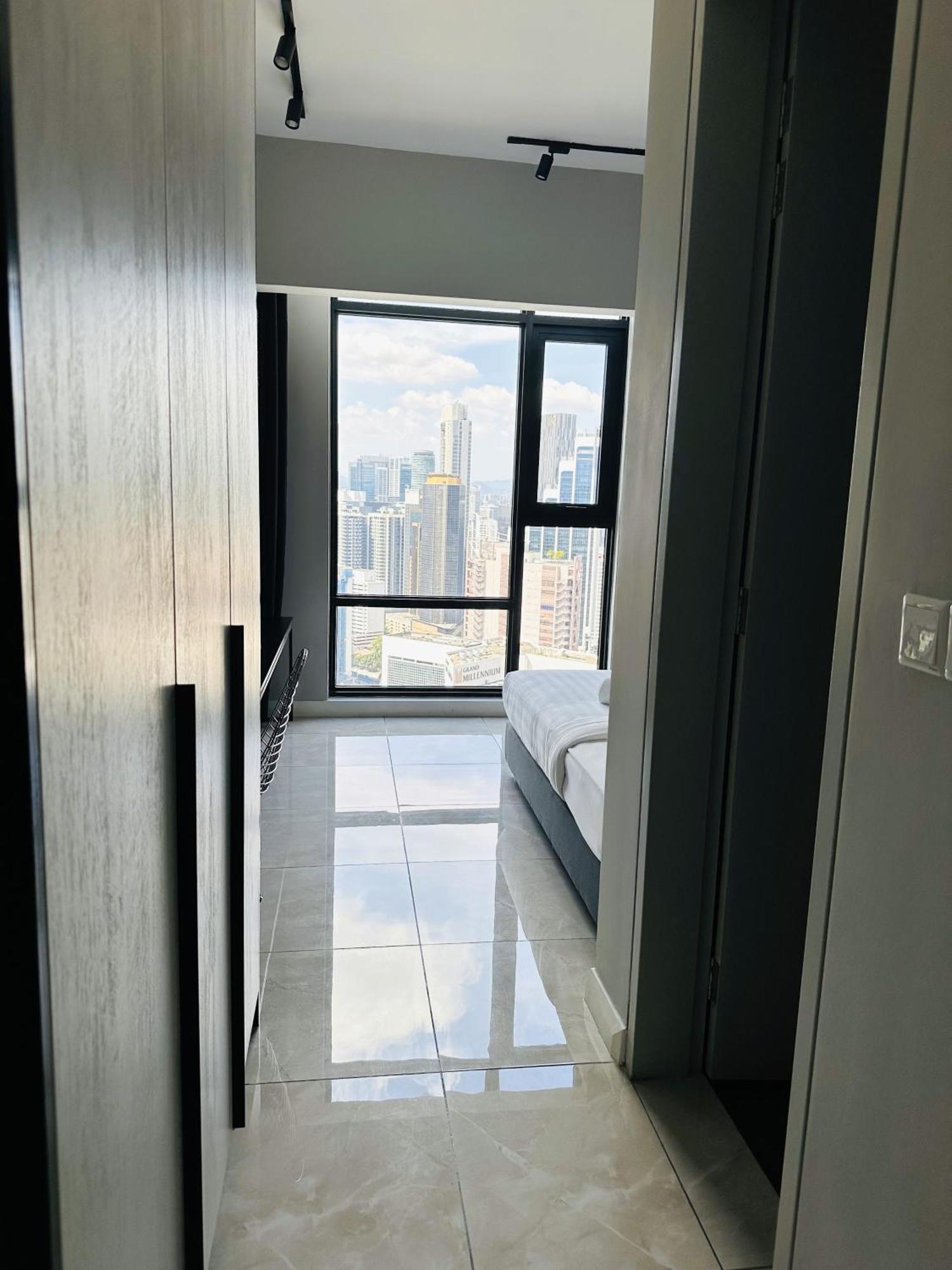 The Axon By Rainbow Touch Apartemen