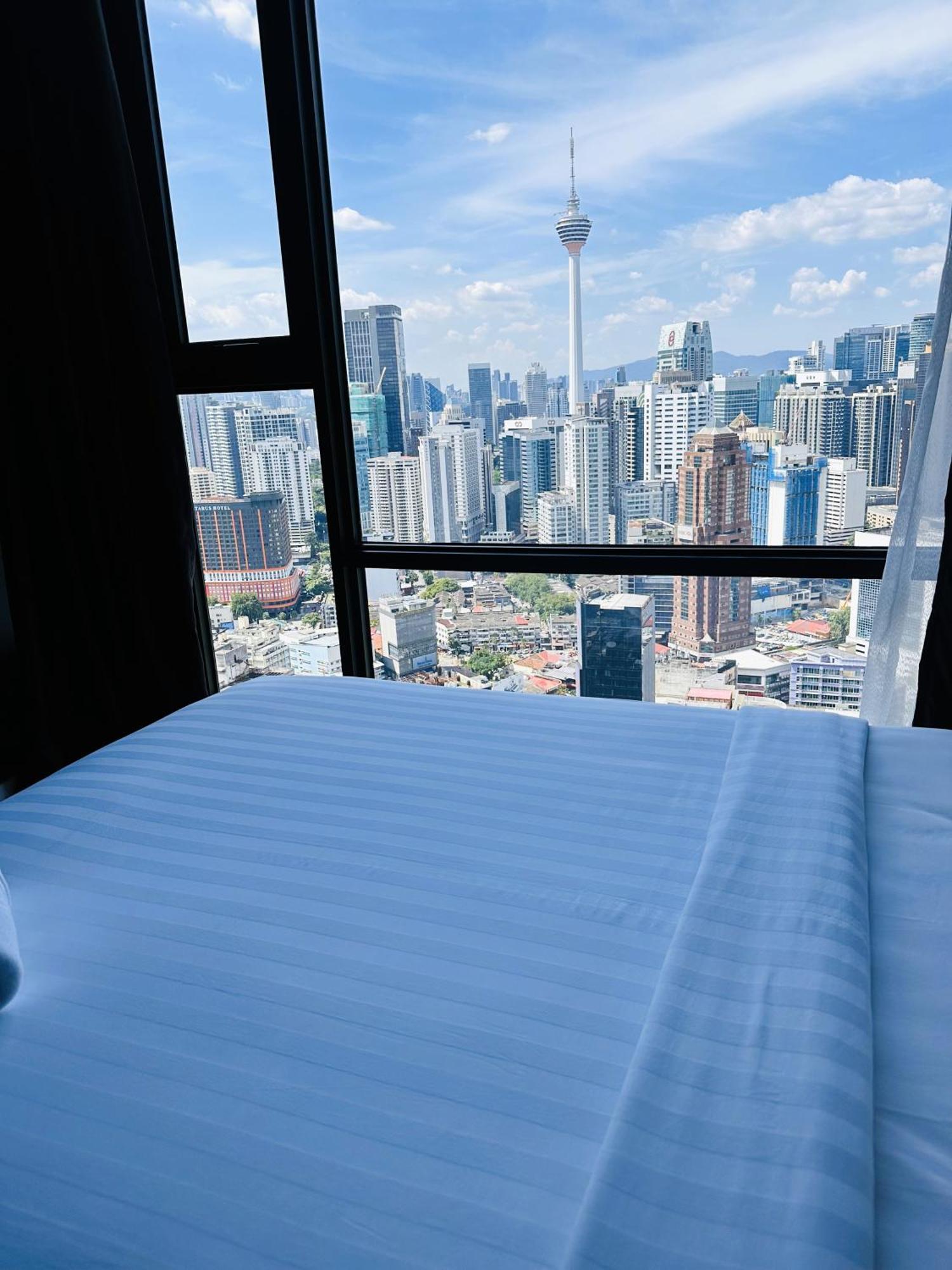 The Axon By Rainbow Touch Apartemen