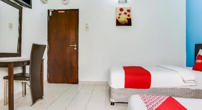 Oyo 89571 Eco Palace